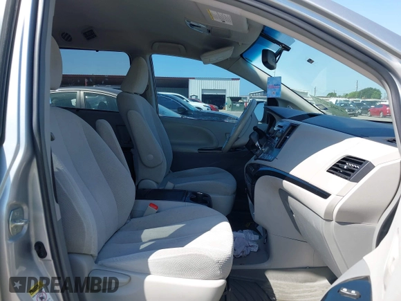 2014 Toyota Sienna LE AAS with VIN 5TDKK3DC4ES447265, listed as a IAAI auction lot 42024631 with 112,890 mi miles and . Bid and sale history available at carsss.com. Image 5.