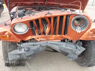 2001 Jeep Wrangler Sport z VIN 1J4FA49S01P341940, wystawiony jako IAAI lot #42542715 z przebiegiem 87 651 mil mil oraz . Historia ofert i sprzedaży dostępna na DreamBid. Obrazek 6.