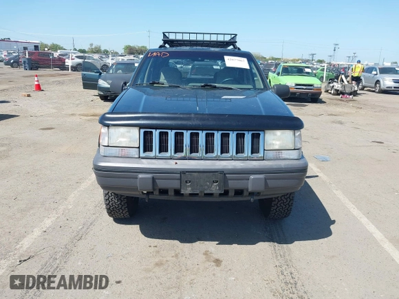 1995 Jeep Grand Cherokee Laredo with VIN 1J4GZ58Y2SC669152, listed as a IAAI auction lot 42077067 with 134,022 mi miles. Bid and sale history available at carsss.com. Image 6.
