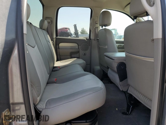2005 Dodge 1500 SLT z VIN 1D7HU18D05S145030, wystawiony jako Copart lot #60825845 z przebiegiem 91 205 mil mil oraz Szkoda całkowita • Salvage title. Historia ofert i sprzedaży dostępna na DreamBid. Obrazek 10.