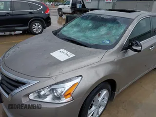 2014 Nissan Altima SV with VIN 1N4AL3AP0EC104072, listed as a IAAI auction lot 41877014 with 173,243 mi miles and . Bid and sale history available at DreamBid. Image 6.