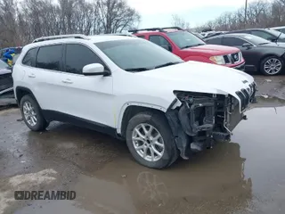 2018 Jeep Cherokee Latitude Plus with VIN 1C4PJMLX5JD581775, listed as a IAAI auction lot 41684428 with 151,225 mi miles. Bid and sale history available at carsss.com. Image 1.