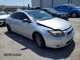 2005 Scion tC with VIN JTKDE177850022873, listed as a Copart auction lot 57166754 with 194,678 mi miles and Salvage Title. Bid and sale history available at carsss.com. Image 4.