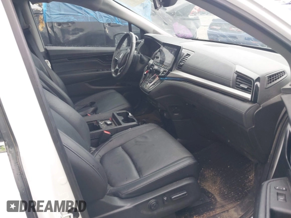 2022 Honda Odyssey Touring with VIN 5FNRL6H87NB058420, listed as a IAAI auction lot 42234499 with 78,633 mi miles and . Bid and sale history available at DreamBid. Image 5.