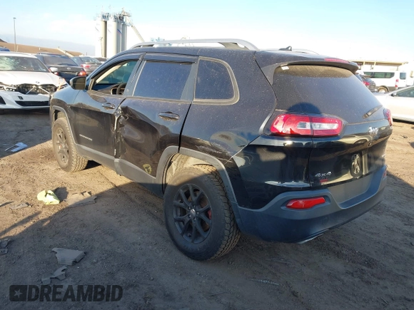 2015 Jeep Cherokee Latitude with VIN 1C4PJMCS0FW745949, listed as a IAAI auction lot 41289847 with 137,440 mi miles and . Bid and sale history available at carsss.com. Image 3.