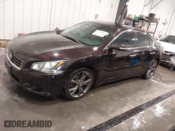 2014 Nissan Maxima SV z VIN 1N4AA5AP5EC910605, wystawiony jako IAAI lot #42082685 z przebiegiem 83 628 mil mil oraz . Historia ofert i sprzedaży dostępna na DreamBid. Obrazek 2.