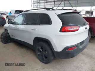 2016 Jeep Cherokee Latitude with VIN 1C4PJLCB5GW207159, listed as a IAAI auction lot 41232649 with 103,991 mi miles. Bid and sale history available at carsss.com. Image 3.