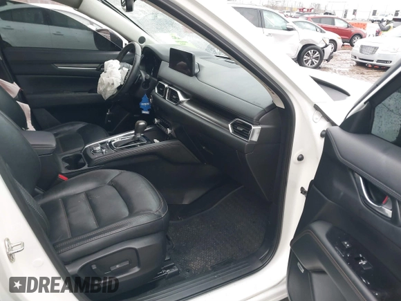 2021 Mazda CX-5 Grand Touring with VIN JM3KFADM4M1340141, listed as a IAAI auction lot 41194711 with 37,887 mi miles. Bid and sale history available at carsss.com. Image 5.