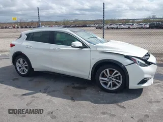 2019 Infiniti QX30 Luxe z VIN SJKCH5CP8KA010331, wystawiony jako IAAI lot #41749668 z przebiegiem 55 486 mil mil oraz . Historia ofert i sprzedaży dostępna na DreamBid. Obrazek 13.