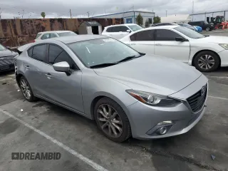 2014 Mazda 3 S Touring with VIN JM1BM1V31E1107453, listed as a Copart auction lot 48769215 with 145,346 mi miles and Salvage Title. Bid and sale history available at DreamBid. Image 4.