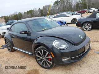 2012 Volkswagen Beetle 2.0T Turbo with VIN 3VW467AT9CM658495, listed as a IAAI auction lot 41505160 with 138,842 mi miles. Bid and sale history available at carsss.com. Image 14.