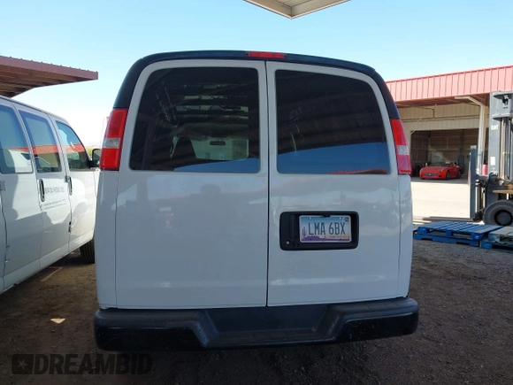 2020 Chevrolet Express Cargo Van with VIN 1GCWGBFP8L1120262, listed as a IAAI auction lot 42010679 with 114,589 mi miles. Bid and sale history available at carsss.com. Image 16.
