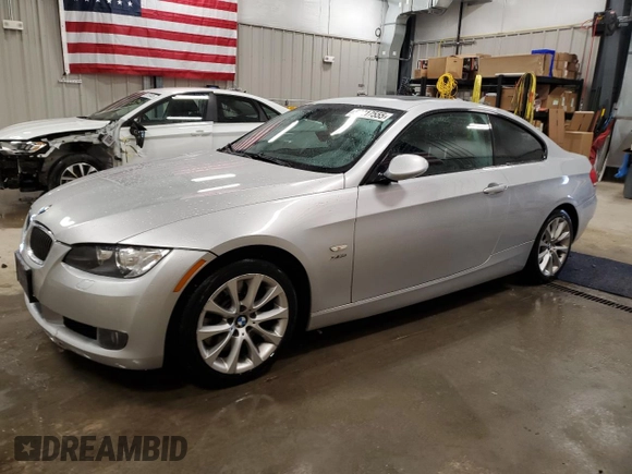2009 BMW 3 Series 335i xDrive with VIN WBAWC735X9E270335, listed as a Copart auction lot 50217555 with 119,339 mi miles and Clean Title. Bid and sale history available at carsss.com. Image 1.