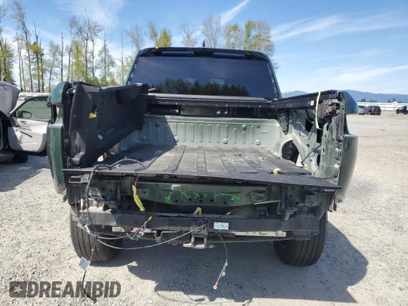 2023 Rivian R1T Adventure with VIN 7FCTGAAA1PN020979, listed as a Copart auction lot 52574025 with 0 mi miles and Salvage Title. Bid and sale history available at carsss.com. Image 6.