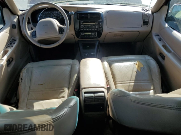 2001 Ford Explorer z VIN 1FMDU64P21UB11722, wystawiony jako Copart lot #57425525 z przebiegiem 116 938 mil mil oraz Szkoda całkowita • Salvage title. Historia ofert i sprzedaży dostępna na DreamBid. Obrazek 8.