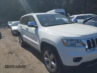 2011 Jeep Grand Cherokee Overland Summit with VIN 1J4RR6GT9BC546825, listed as a IAAI auction lot 42118789 with 123,449 mi miles. Bid and sale history available at carsss.com. Image 6.
