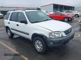 1999 Honda CR-V LX z VIN JHLRD2847XC001737, wystawiony jako IAAI lot #42343722 z przebiegiem 199 425 mil mil oraz . Historia ofert i sprzedaży dostępna na DreamBid. Obrazek 1.