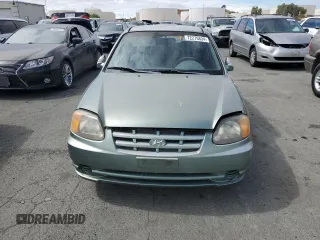 2003 Hyundai Accent GL with VIN KMHCG35C13U277732, listed as a Copart auction lot 72276634 with 135,176 mi miles and Salvage Title. Bid and sale history available at carsss.com. Image 5.