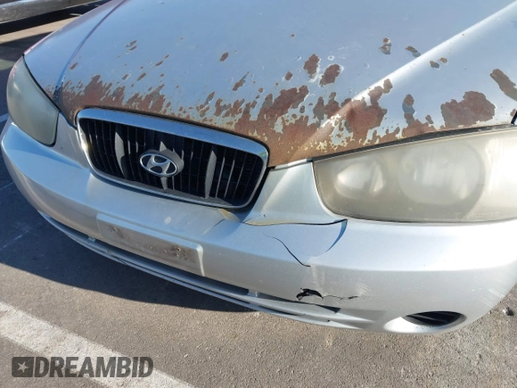 2003 Hyundai Elantra GLS z VIN KMHDN45D63U553542, wystawiony jako IAAI lot #42032294 z przebiegiem 164 210 mil mil oraz . Historia ofert i sprzedaży dostępna na DreamBid. Obrazek 14.