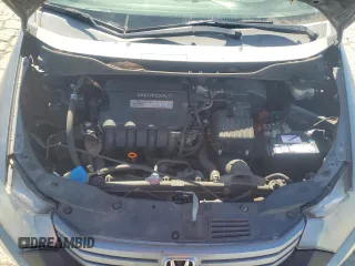 2011 Honda Insight EX z VIN JHMZE2H71BS006434, wystawiony jako Copart lot #58045495 z przebiegiem 270 645 mil mil oraz Czysty tytuł • Clean title. Historia ofert i sprzedaży dostępna na DreamBid. Obrazek 11.
