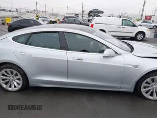 2016 Tesla Model S 70 with VIN 5YJSA1E17GF156514, listed as a IAAI auction lot 41869006 with 17,704 mi miles and . Bid and sale history available at DreamBid. Image 13.