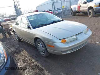 2002 Saturn SL with VIN 1G8ZK52752Z194235, listed as a IAAI auction lot 41792837 with 152,337 mi miles. Bid and sale history available at carsss.com. Image 1.