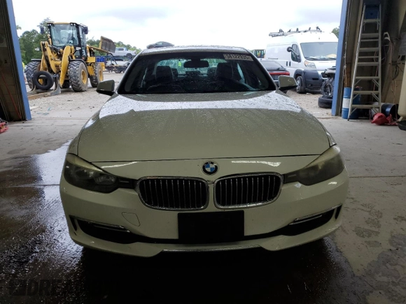 2013 BMW 3 Series 328i with VIN WBA3A5G52DNP18972, listed as a Copart auction lot 58122935 with 209,173 mi miles and Salvage title. Bid and sale history available at DreamBid. Image 6.