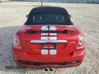 2013 MINI Roadster S z VIN WMWSY3C56DT593875, wystawiony jako Copart lot #74982124 z przebiegiem 64 622 mil mil oraz Szkody całkowita. Historia ofert i sprzedaży dostępna na DreamBid. Obrazek 6.