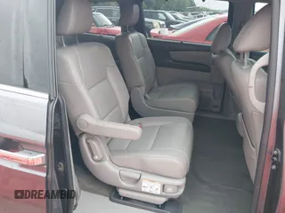 2016 Honda Odyssey Touring Elite with VIN 5FNRL5H96GB063176, listed as a IAAI auction lot 42157604 with 106,177 mi miles. Bid and sale history available at carsss.com. Image 8.