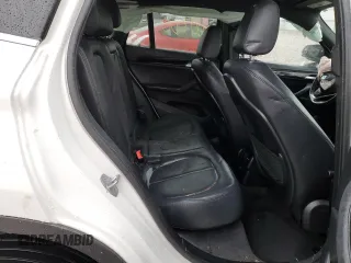 2019 BMW X1 sDrive28i with VIN WBXHU7C53K5L12037, listed as a Copart auction lot 65538082 with Not Provided miles. Bid and sale history available at carsss.com. Image 6.