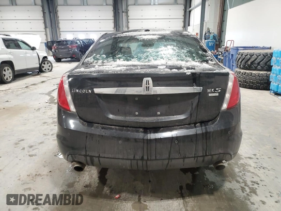 2012 Lincoln MKS z VIN 1LNHL9ER5CG806929, wystawiony jako Copart lot #85328514 z przebiegiem 155 015 mil mil oraz Szkoda całkowita • Salvage title. Historia ofert i sprzedaży dostępna na DreamBid. Obrazek 6.