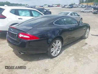 2012 Jaguar XK with VIN SAJWA4FB8CLB47049, listed as a IAAI auction lot 42118136 with 60,953 mi miles. Bid and sale history available at carsss.com. Image 4.