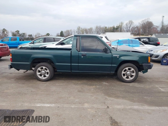 1992 Mitsubishi Mighty Max z VIN JA7FL24W5NP011633, wystawiony jako IAAI lot #41864873 z przebiegiem 301 895 mil mil oraz . Historia ofert i sprzedaży dostępna na DreamBid. Obrazek 13.
