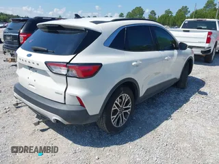2020 Ford Escape SEL with VIN 1FMCU0H60LUC42743, listed as a IAAI auction lot 42569643 with 57,313 mi miles and . Bid and sale history available at DreamBid. Image 4.
