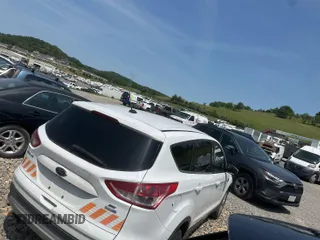 2014 Ford Escape SE z VIN 1FMCU9GX8EUC02895, wystawiony jako IAAI lot #42511705 z przebiegiem 104 900 mil mil oraz . Historia ofert i sprzedaży dostępna na DreamBid. Obrazek 29.