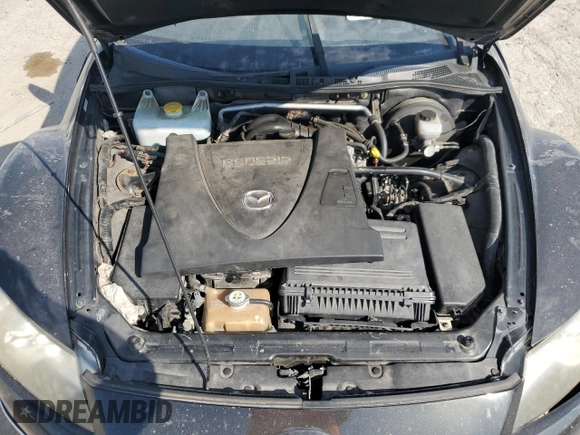 2011 Mazda RX-8 Grand Touring z VIN JM1FE1SM7B0405115, wystawiony jako Copart lot #72286084 z przebiegiem Nie podano mil oraz Szkoda całkowita • Salvage title. Historia ofert i sprzedaży dostępna na DreamBid. Obrazek 12.
