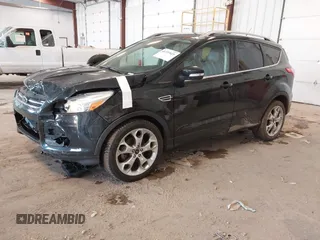 2016 Ford Escape Titanium with VIN 1FMCU0JX3GUB70607, listed as a IAAI auction lot 41727421 with 106,857 mi miles. Bid and sale history available at carsss.com. Image 19.