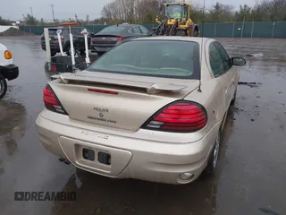 2003 Pontiac Grand Am SE1 with VIN 1G2NF52E03C327760, listed as a IAAI auction lot 41718054 with 156,173 mi miles. Bid and sale history available at carsss.com. Image 4.