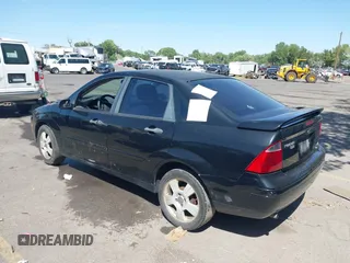 2007 Ford Focus S with VIN 1FAFP34N47W313952, listed as a IAAI auction lot 42799614 with 247,541 mi miles and . Bid and sale history available at DreamBid. Image 3.