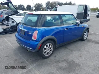 2005 MINI Hardtop with VIN WMWRC33585TJ69273, listed as a IAAI auction lot 42041797 with 150,983 mi miles and . Bid and sale history available at DreamBid. Image 4.