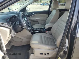 2015 Ford Escape Titanium with VIN 1FMCU0J98FUA46879, listed as a Copart auction lot 51173555 with 72,093 mi miles and Salvage Title. Bid and sale history available at DreamBid. Image 7.