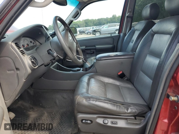 2004 Ford Explorer Sport Trac XLS z VIN 1FMZU77K84UB23731, wystawiony jako Copart lot #65250575 z przebiegiem 236 109 mil mil oraz Szkoda całkowita • Salvage title. Historia ofert i sprzedaży dostępna na DreamBid. Obrazek 7.