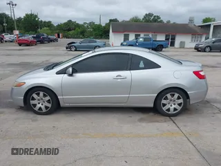 2006 Honda Civic Cpe LX with VIN 2HGFG12606H568106, listed as a IAAI auction lot 41983712 with 196,957 mi miles. Bid and sale history available at carsss.com. Image 14.