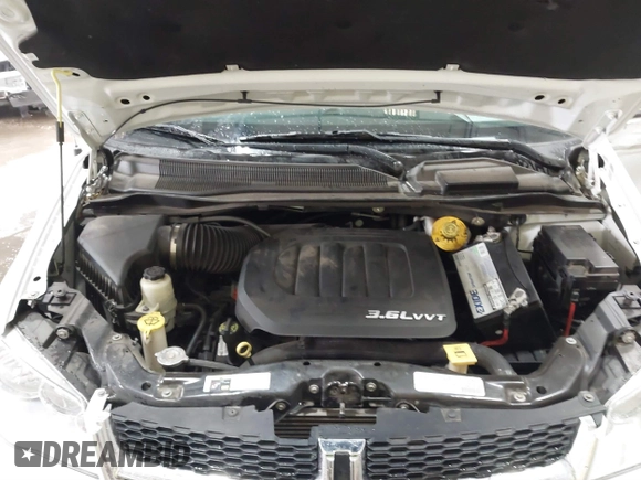 2018 Dodge Grand Caravan SE with VIN 2C4RDGBG5JR190786, listed as a IAAI auction lot 41603163 with 102,351 mi miles and . Bid and sale history available at DreamBid. Image 10.