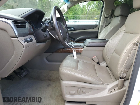 2016 Chevrolet Tahoe LTZ z VIN 1GNSKCKC4GR208861, wystawiony jako Copart lot #56832895 z przebiegiem 132 982 mil mil oraz Szkoda całkowita • Salvage title. Historia ofert i sprzedaży dostępna na DreamBid. Obrazek 8.