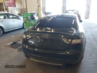 2009 Audi S5 z VIN WAURV78T29A028113, wystawiony jako IAAI lot #41677413 z przebiegiem 138 434 mil mil oraz . Historia ofert i sprzedaży dostępna na DreamBid. Obrazek 16.
