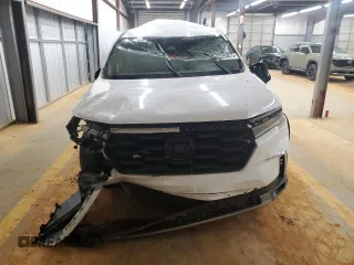 2025 Honda Pilot EX-L z VIN 5FNYG2H42SB018358, wystawiony jako Copart lot #52250875 z przebiegiem Nie podano mil oraz Szkoda całkowita • Salvage title. Historia ofert i sprzedaży dostępna na DreamBid. Obrazek 5.