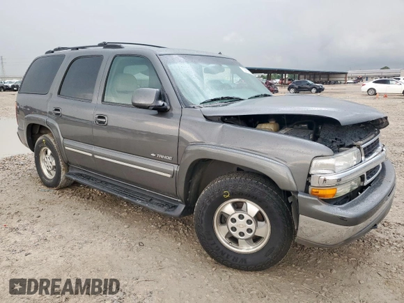 2002 Chevrolet Tahoe LT with VIN 1GNEC13Z22J139029, listed as a Copart auction lot 59149945 with 188,598 mi miles and Salvage title. Bid and sale history available at DreamBid. Image 4.