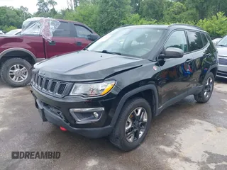 2018 Jeep Compass Trailhawk z VIN 3C4NJDDB1JT264032, wystawiony jako IAAI lot #42524893 z przebiegiem 96 399 mil mil oraz . Historia ofert i sprzedaży dostępna na DreamBid. Obrazek 2.