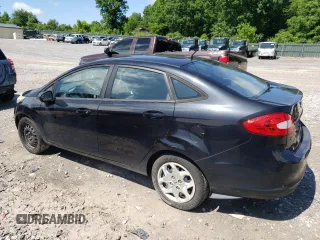 2012 Ford Fiesta SE z VIN 3FADP4BJ5CM195837, wystawiony jako Copart lot #57363165 z przebiegiem 108 003 mil mil oraz Szkoda całkowita • Salvage title. Historia ofert i sprzedaży dostępna na DreamBid. Obrazek 2.